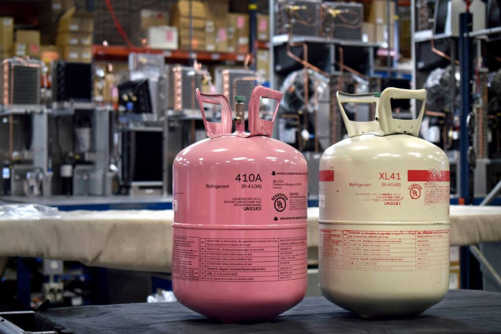 R-454B and R-410A refrigerant canisters at the Thermal Edge facility in Irving, Texas, showcasing the transition to environmentally friendly refrigerants.